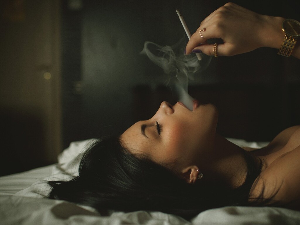 Smoking Cam Girl in Black Lingerie