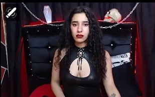 BDSM Model in Black Latex Dress